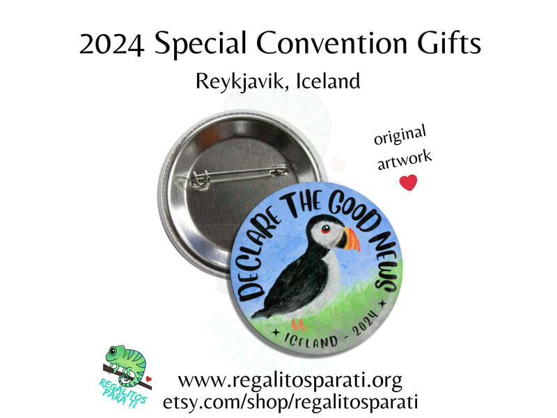 Pin back button with a hand painted puffin and the text "Declare the Good News Iceland 2024"