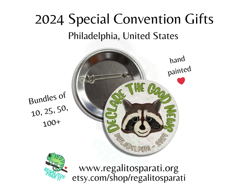 A button pin featuring a hand painted raccoon surround by the text "Declare the Good News Philadelphia 2024"